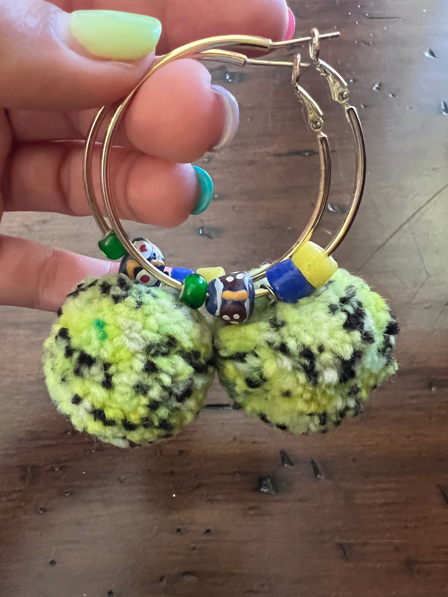 Pom Pom Earrings on Large Gold Hoops