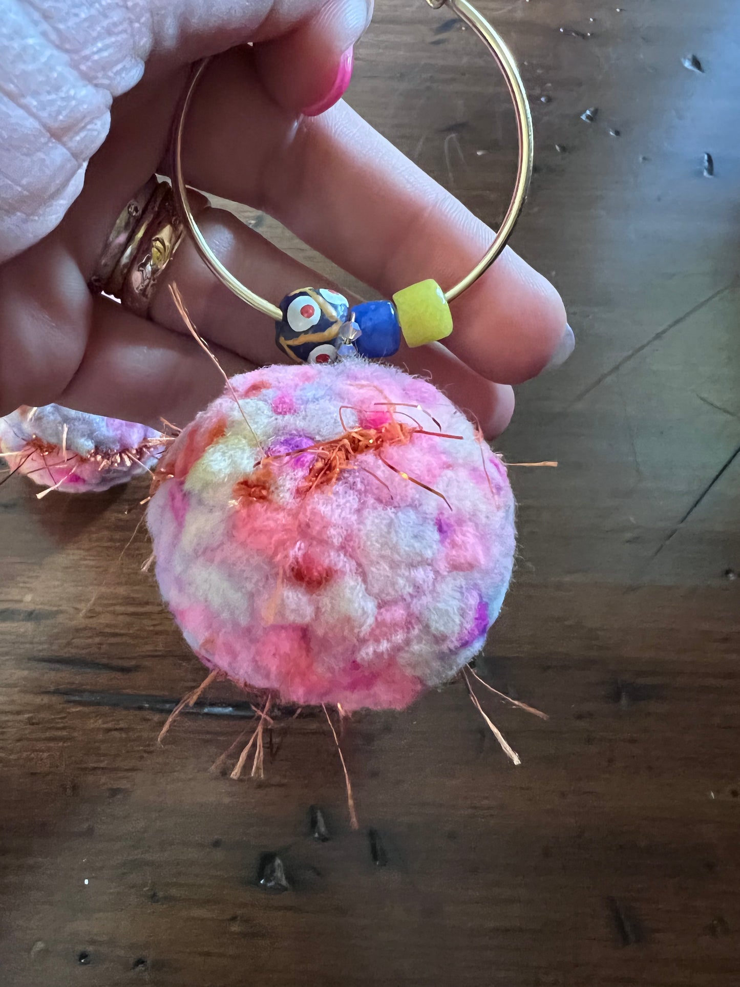 Pom Pom Earrings on Large Gold Hoops