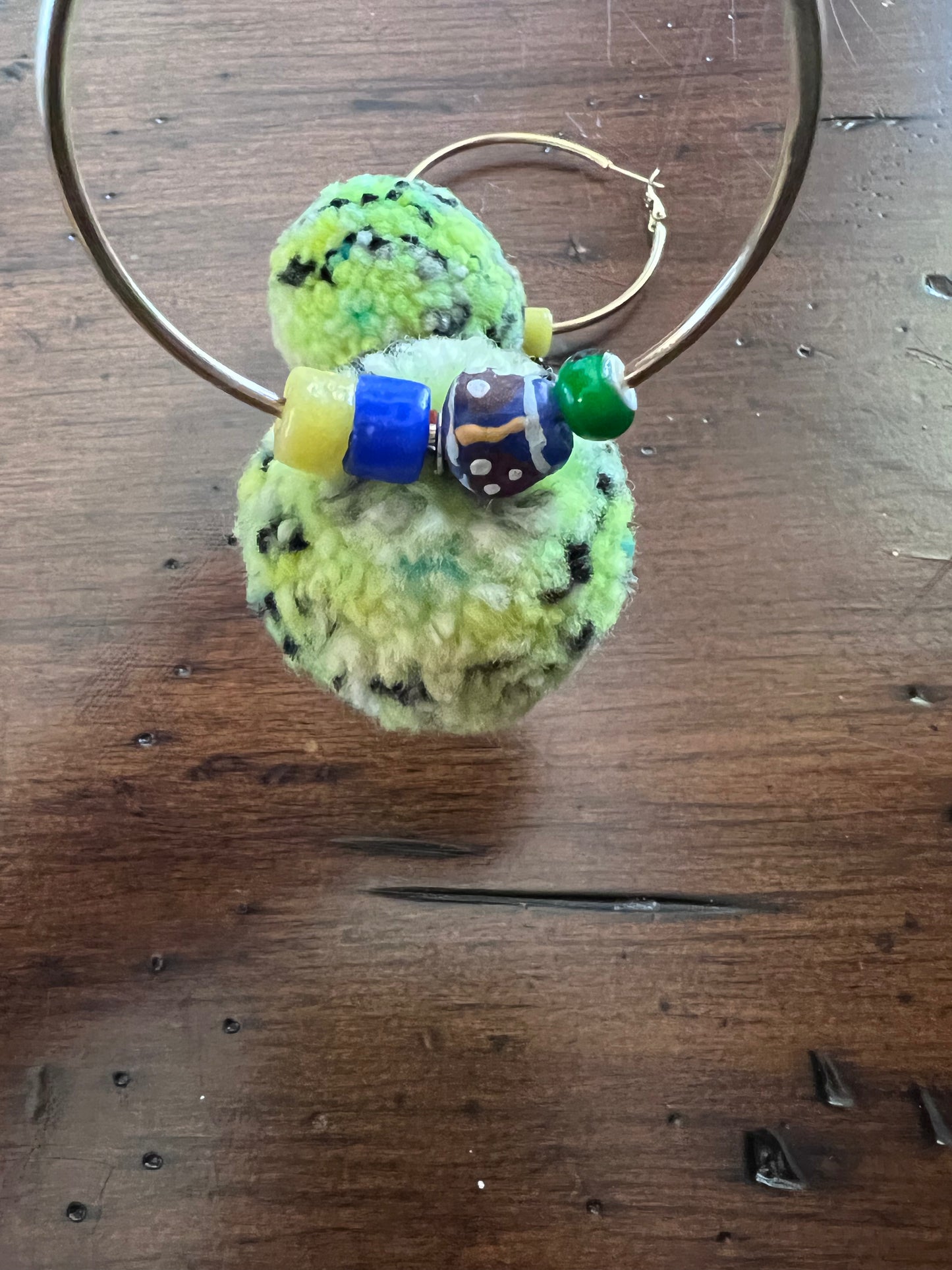 Pom Pom Earrings on Large Gold Hoops